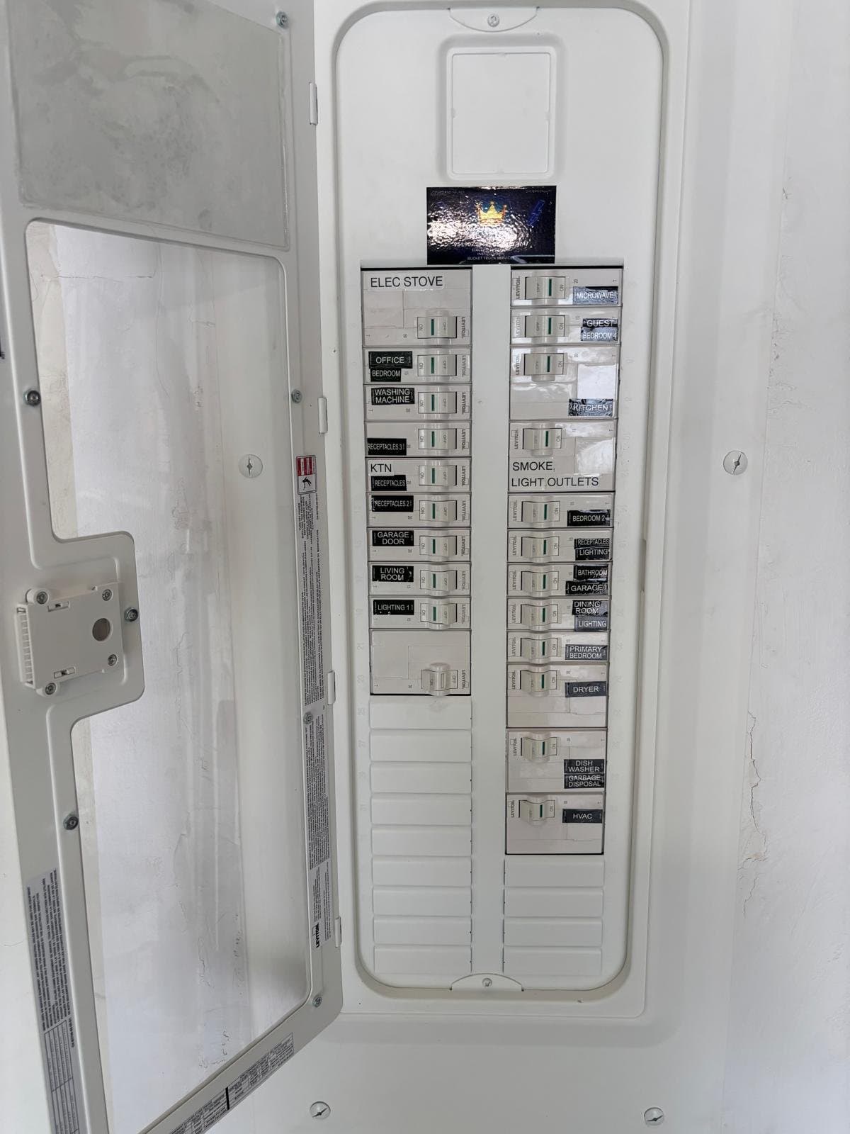 A new Leviton load center installed and labeled by Ghost Crown Electric, every breaker marked by room